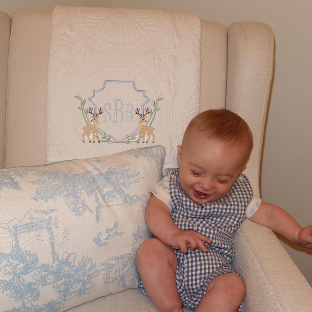 Custom embroidered deer crest baby quilt keepsake by Allie Anna Co.